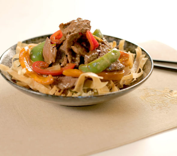Juicy Black Pepper Steak Stir Fry on Crispy Spring Rolls