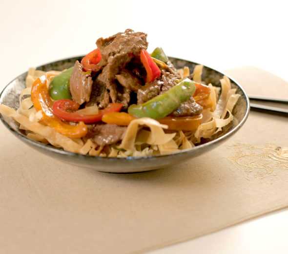 Juicy Black Pepper Steak Stir Fry on Crispy Spring Rolls